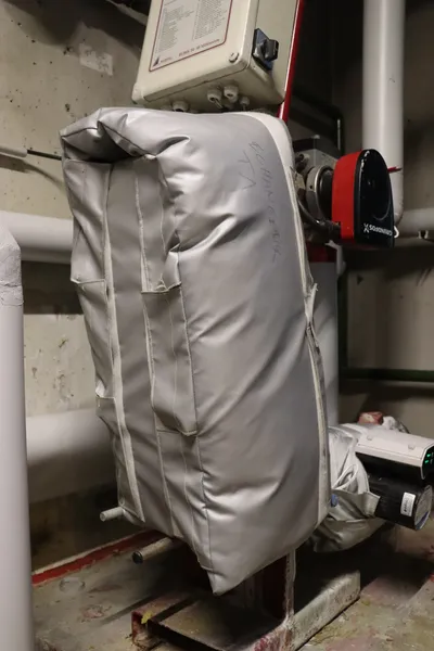 pose d'un matelas isolant sur un échnageur Isogeur